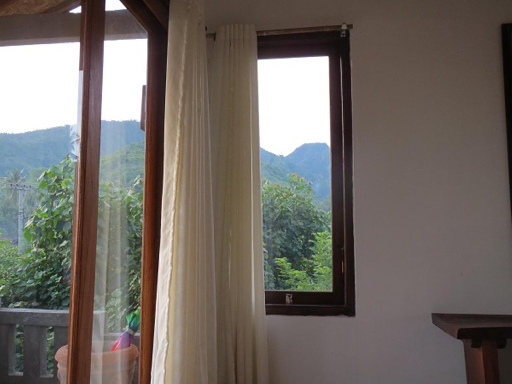 Bali Sari Homestay Amed Quarto foto